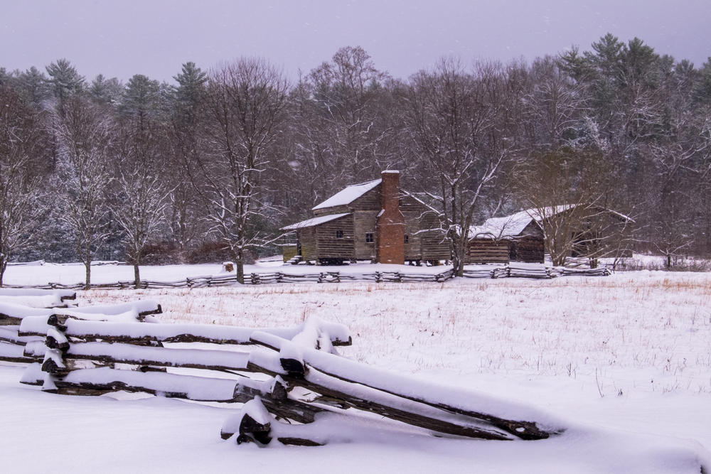 cabin in Cades Cove covered in snow