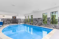 bear mountain lodge is one of the top luxury Pigeon Forge cabins with indoor pools
